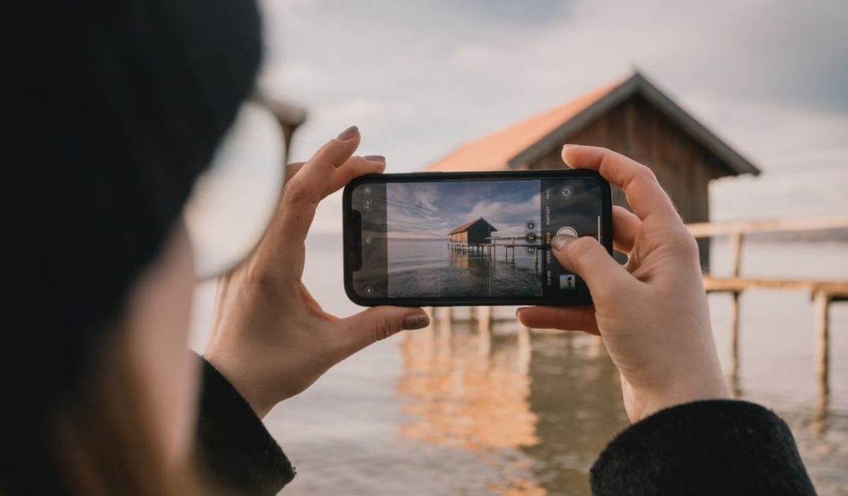 How to hide photos on an iPhone without deleting them from the Photos app.